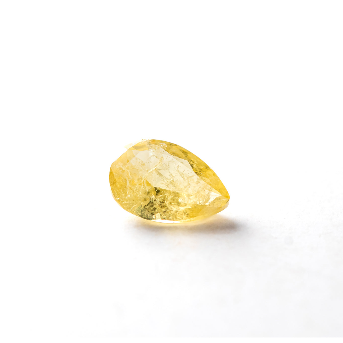 Nanosital #Z-7606 Yellow Sapphire with inclusions Pear 10*7 mm