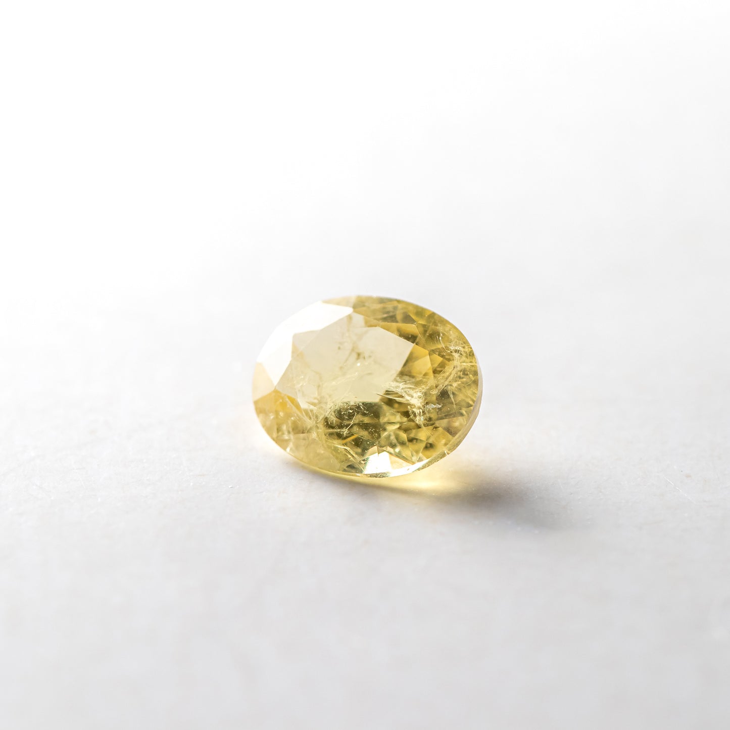 Nanosital #Z-7606 Yellow Sapphire with inclusions Oval 10*8 mm, 8*6 mm