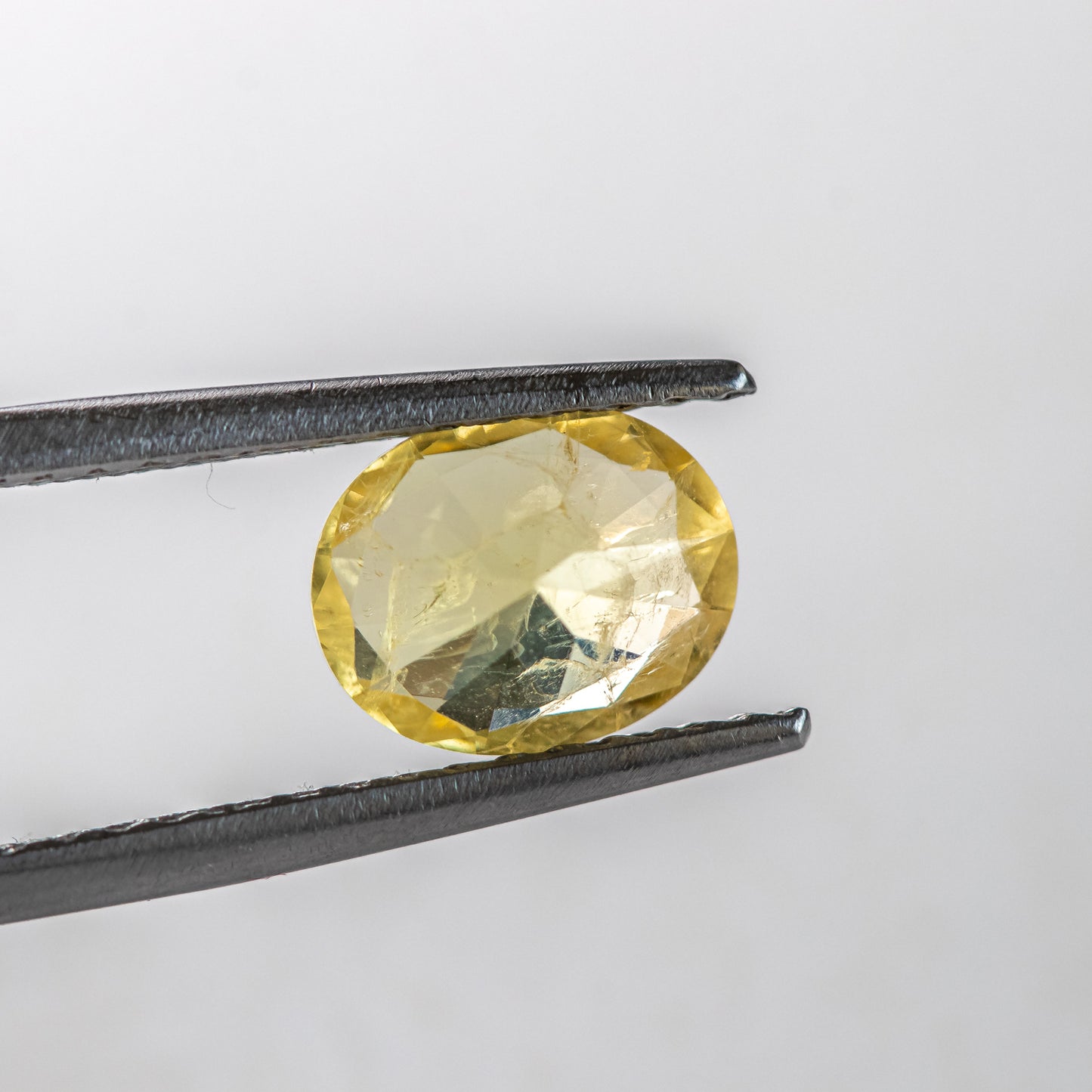 Nanosital #Z-7606 Yellow Sapphire with inclusions Oval 10*8 mm, 8*6 mm
