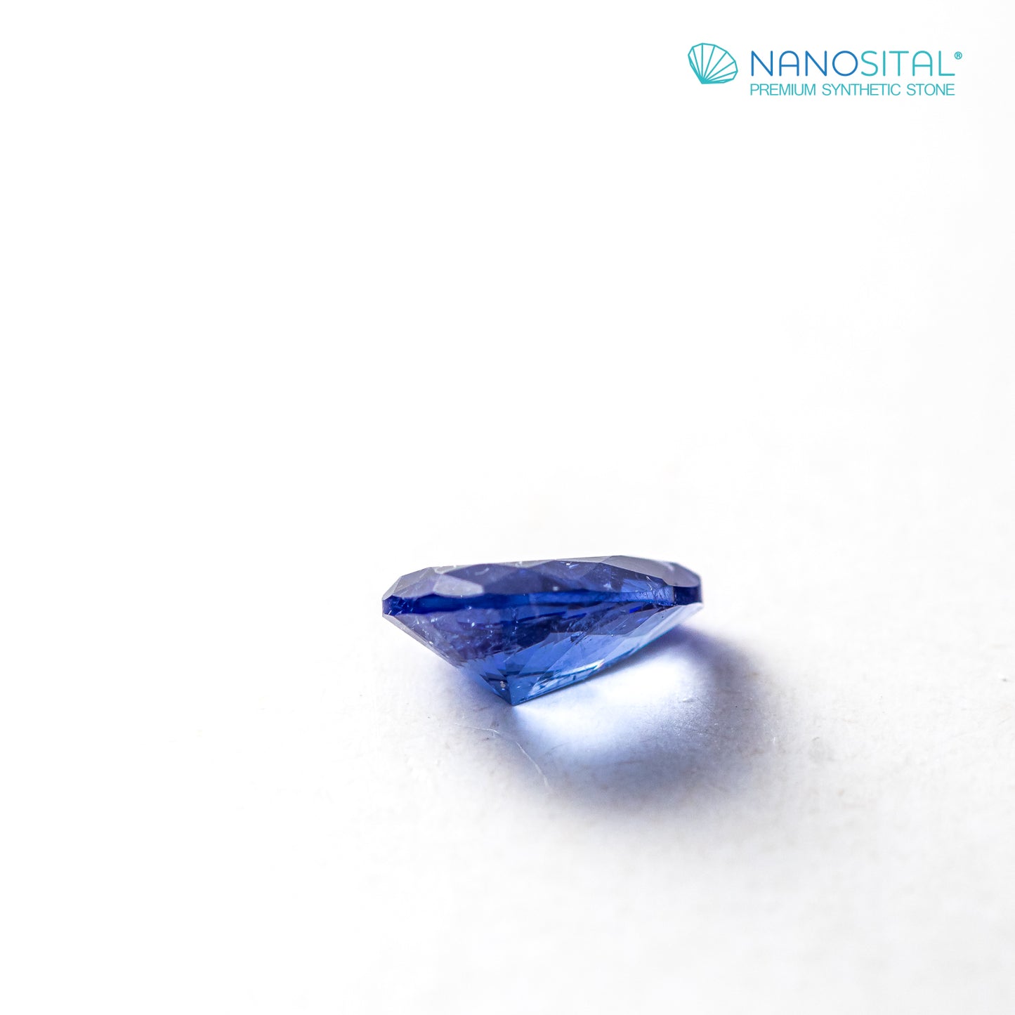 Nanosital #Z-597 Blue Sapphire with inclusions Pear 10*7 mm