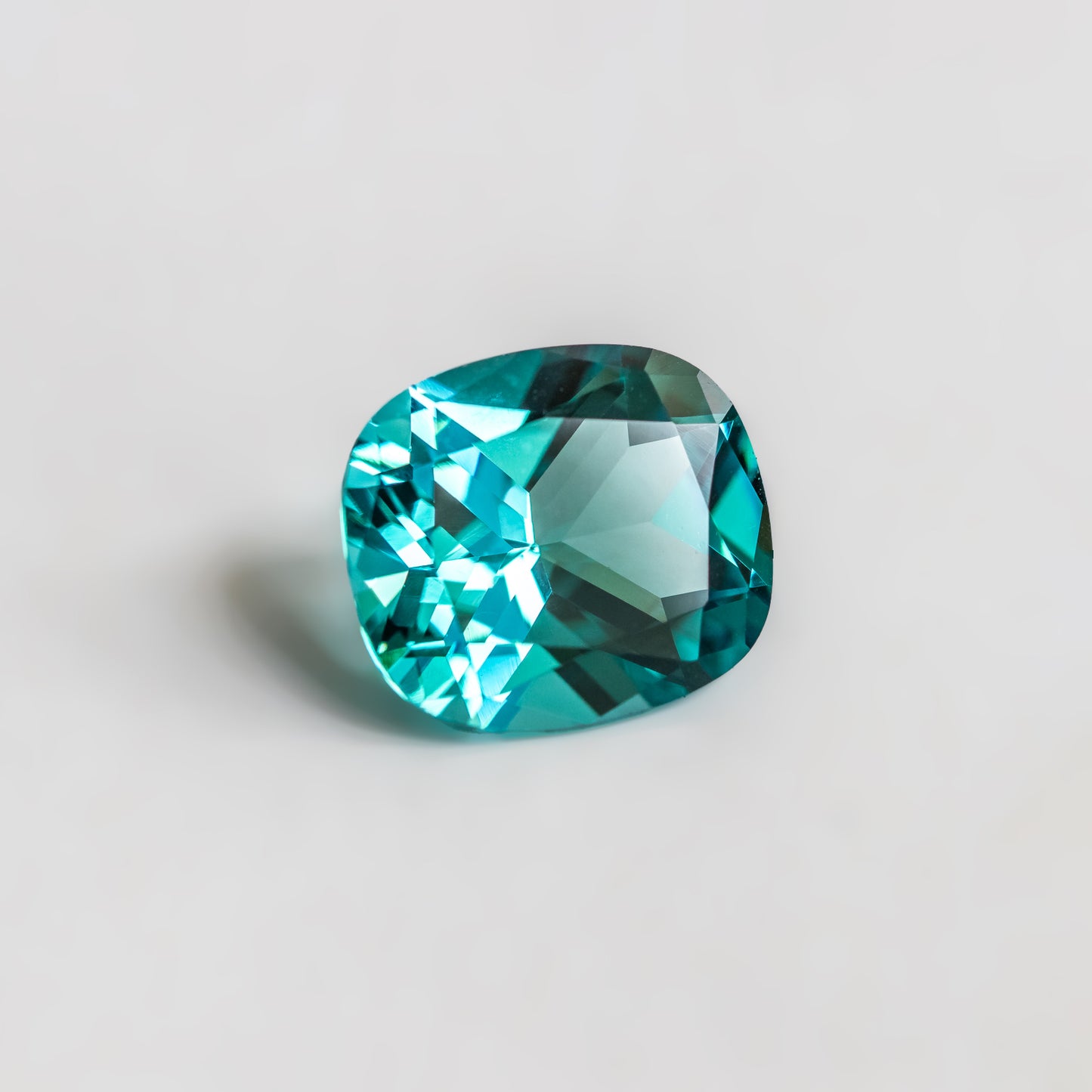 Nanosital #A-108/B Paraiba Cushion 16*14 mm