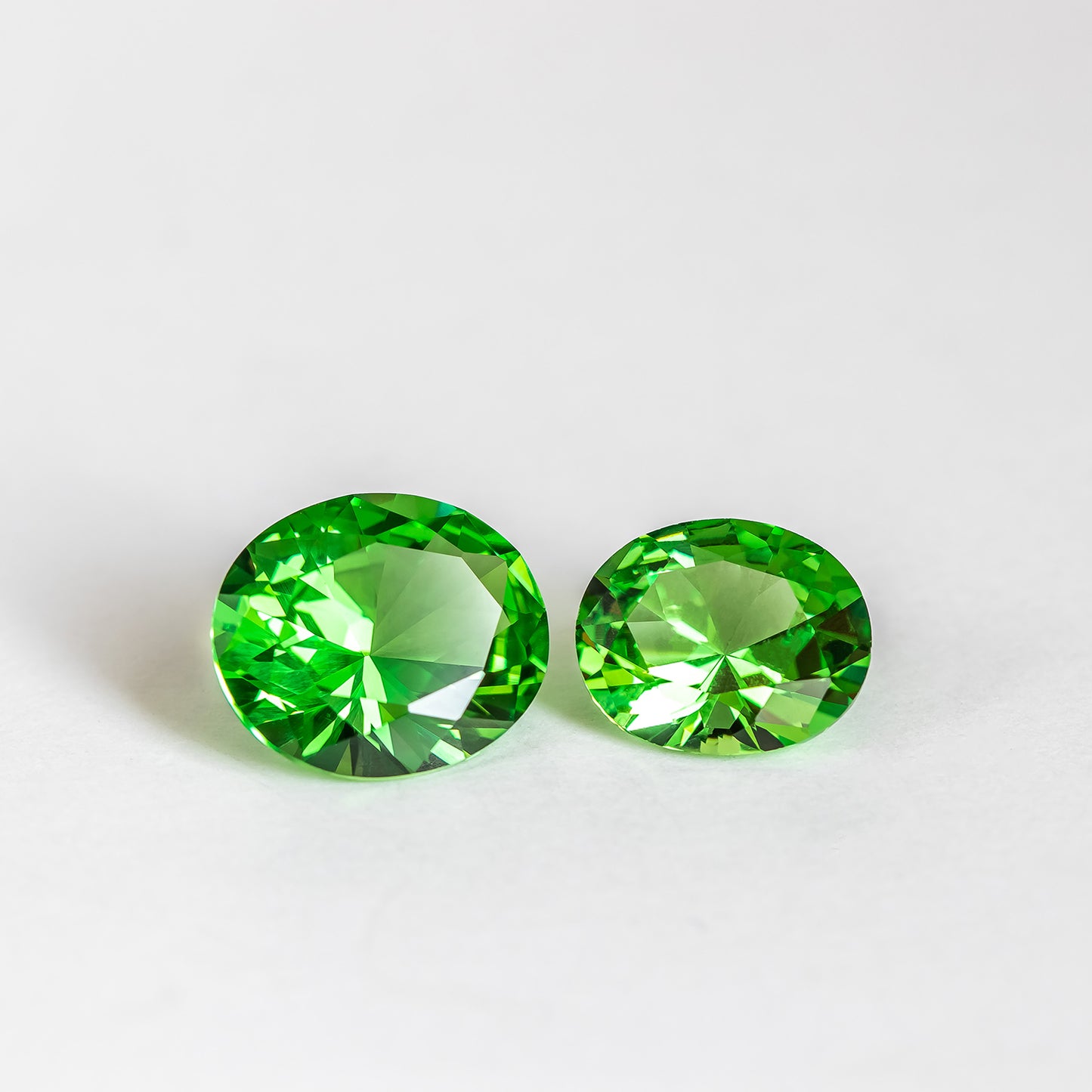 Nanosital #A-3855 Tsavorite Oval 14*12 mm, 12*10 mm