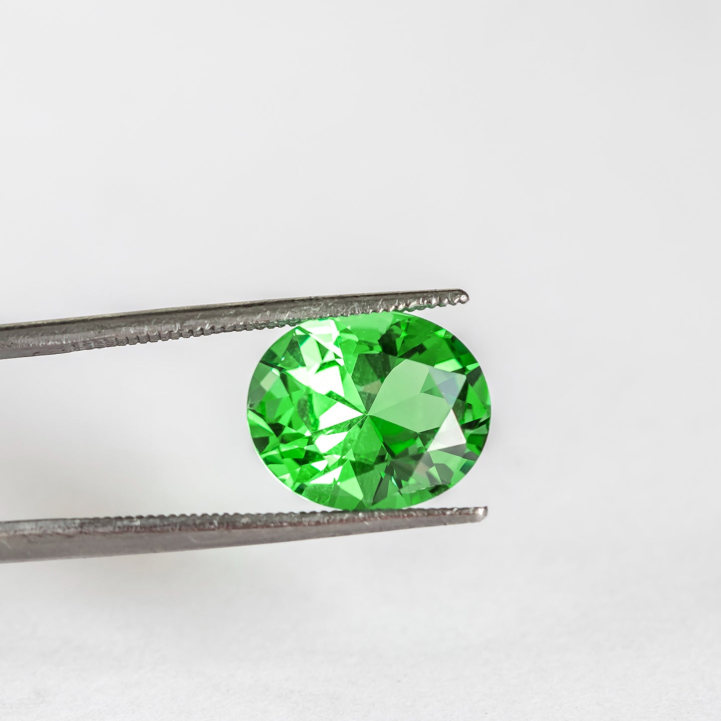 Nanosital #A-3855 Tsavorite Oval 14*12 mm, 12*10 mm