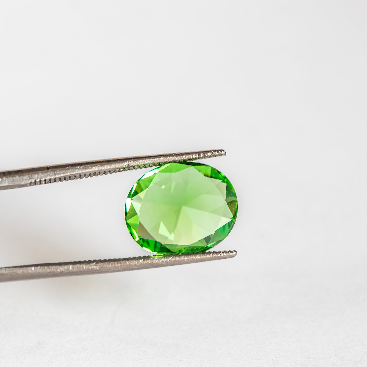 Nanosital #A-3855 Tsavorite Oval 14*12 mm, 12*10 mm