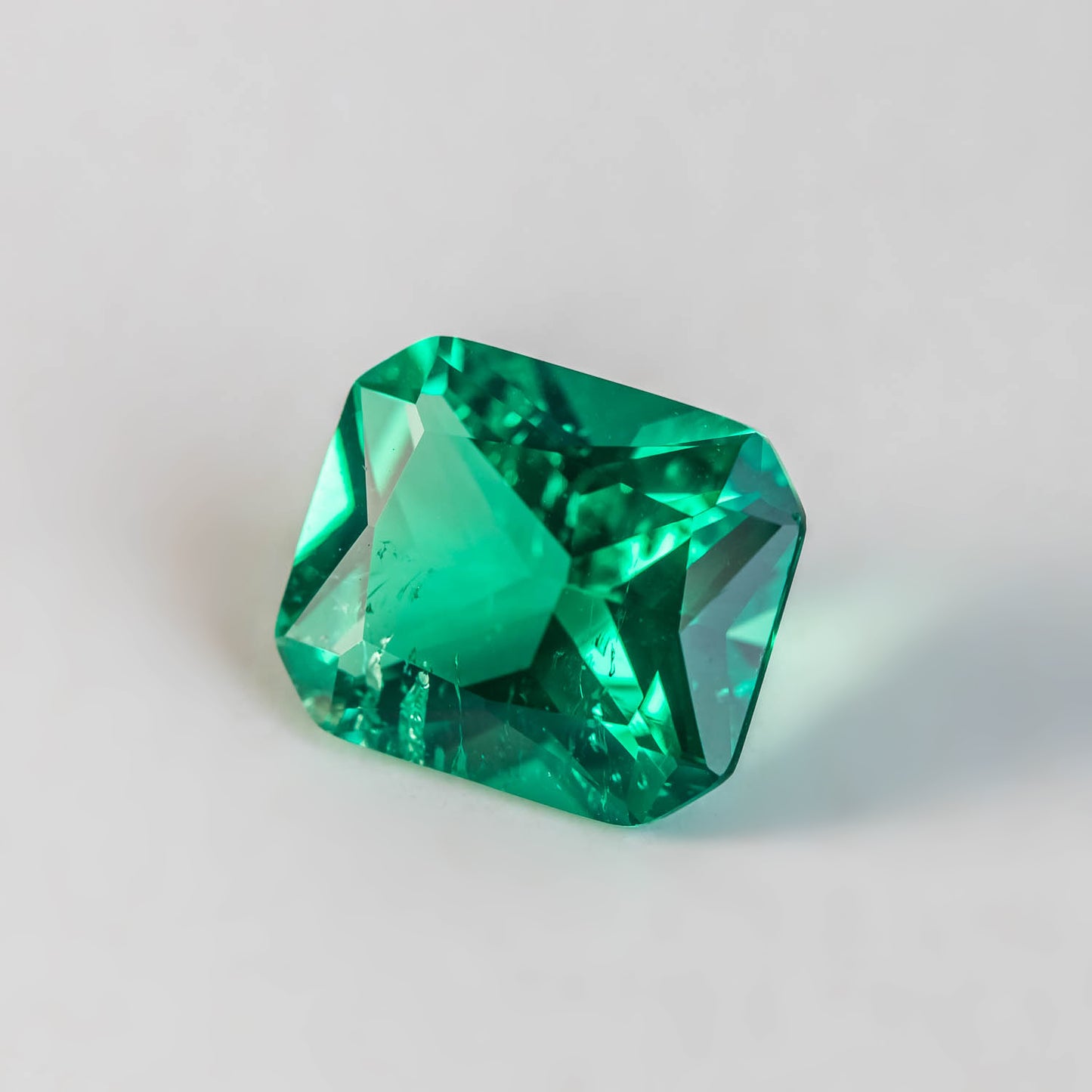 Nanosital #Z 0/4 Emerald with inclusions Octagon 14*12 mm Princess cut