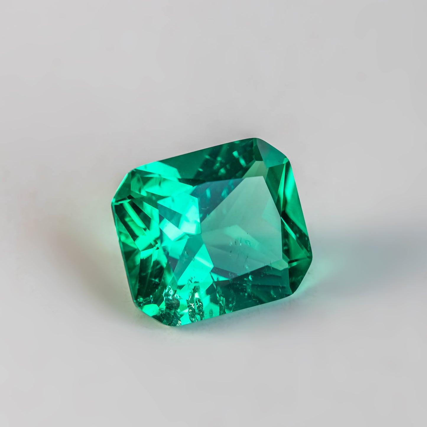 Nanosital #Z 0/4 Emerald with inclusions Octagon 14*12 mm Princess cut