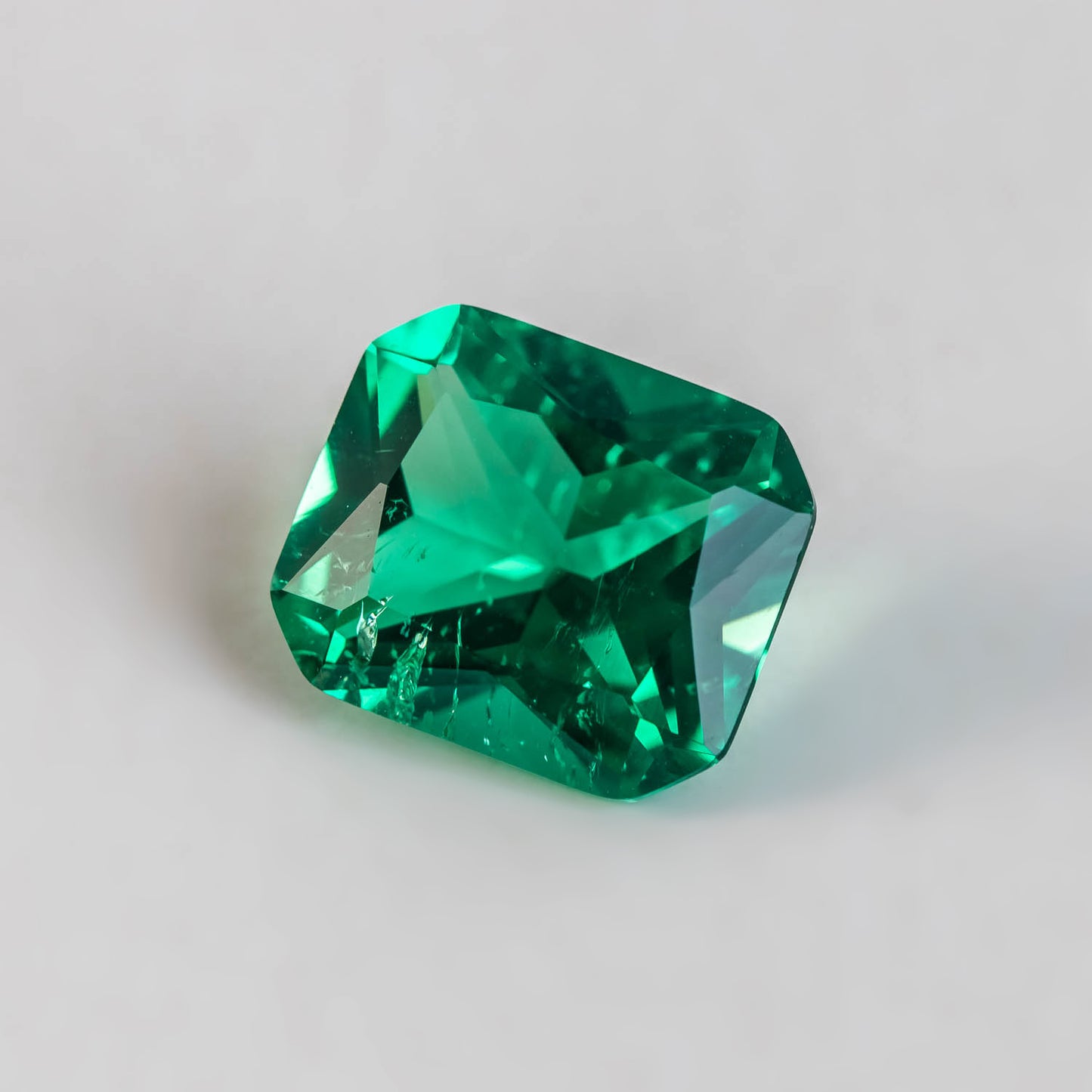 Nanosital #Z 0/4 Emerald with inclusions Octagon 14*12 mm Princess cut