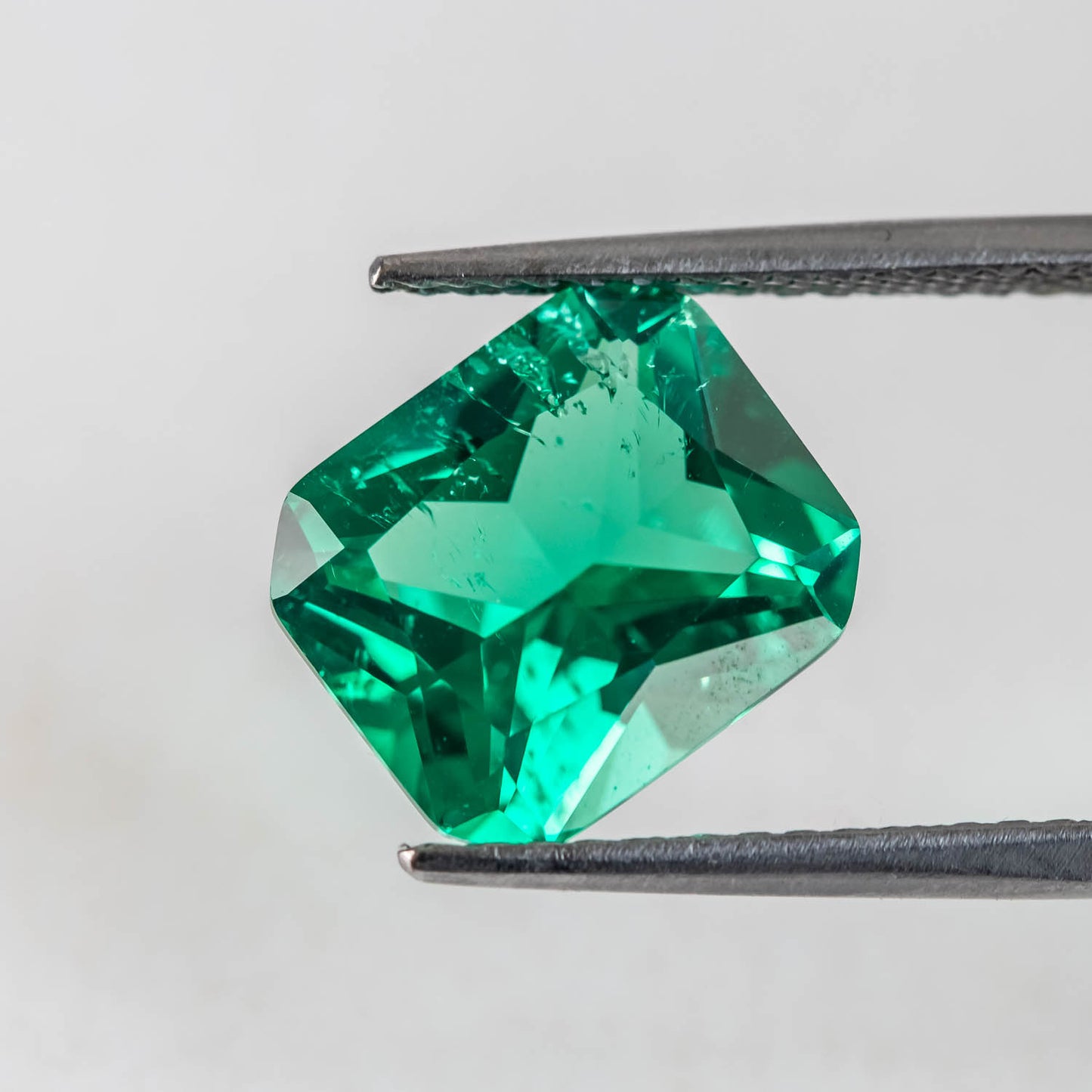 Nanosital #Z 0/4 Emerald with inclusions Octagon 14*12 mm Princess cut