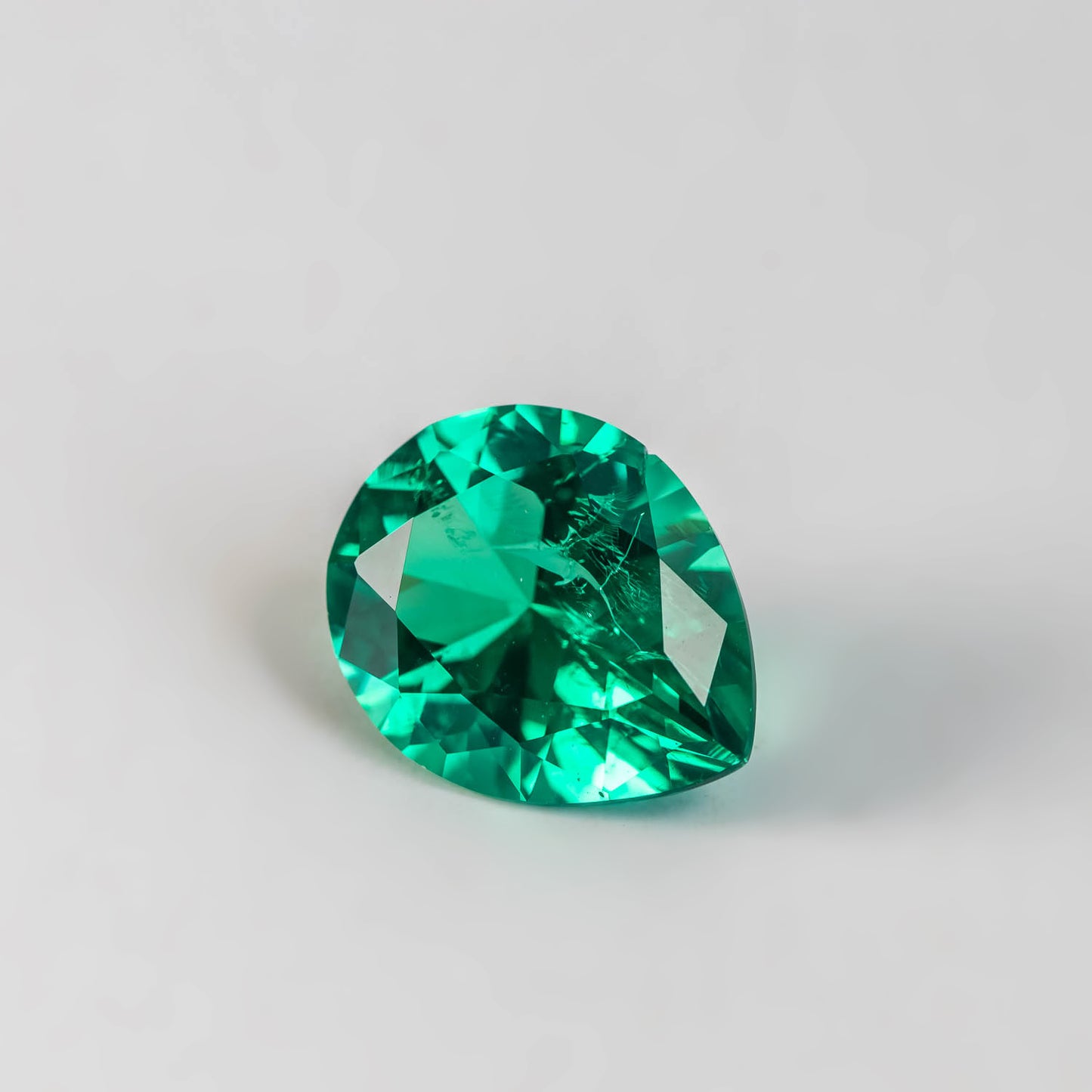 Nanosital #Z 0/4 Emerald with inclusions Pear 16*13 mm