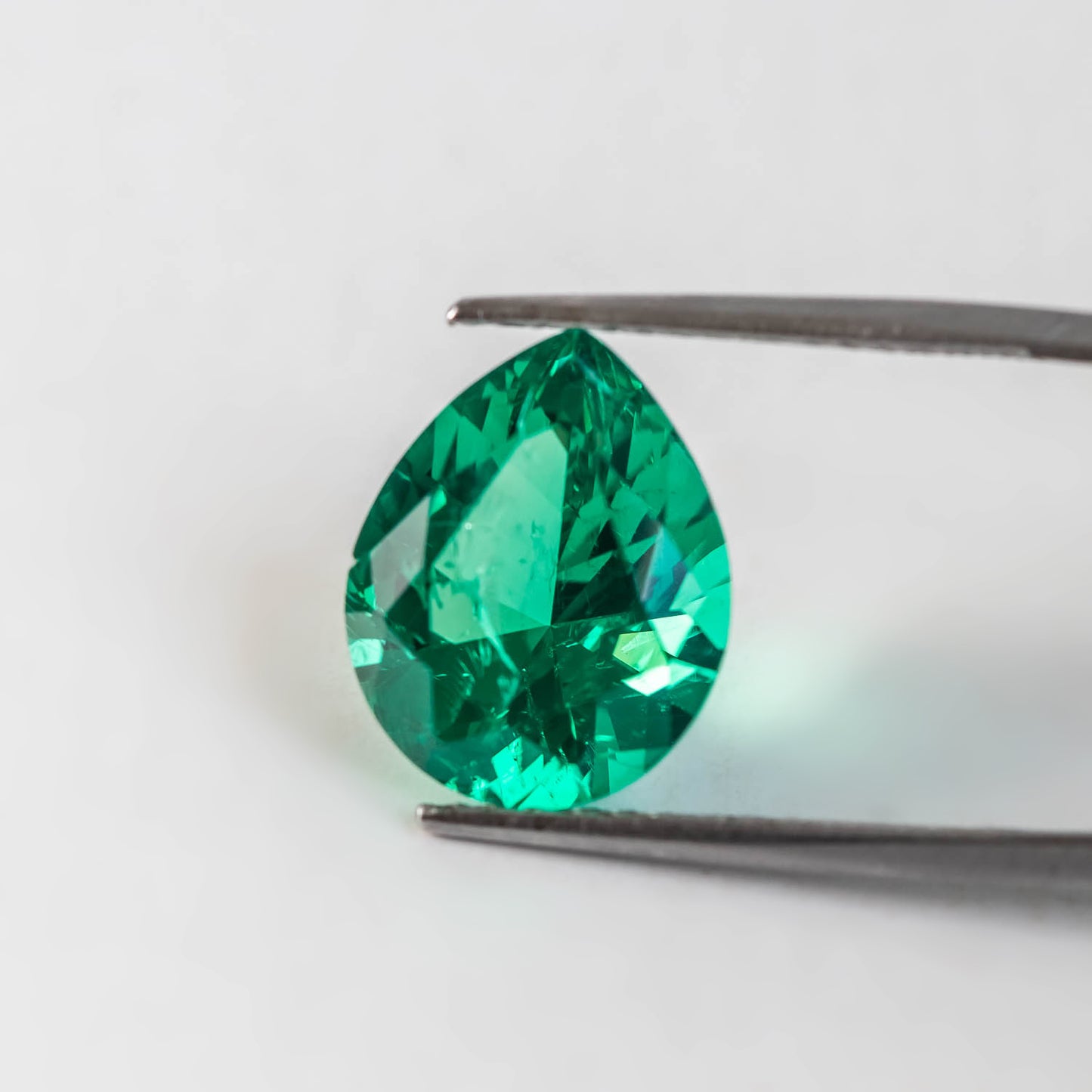 Nanosital #Z 0/4 Emerald with inclusions Pear 16*13 mm