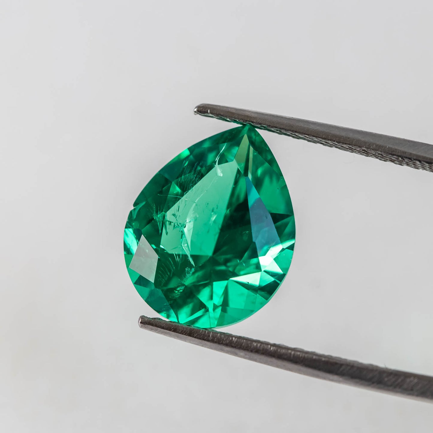 Nanosital #Z 0/4 Emerald with inclusions Pear 16*13 mm