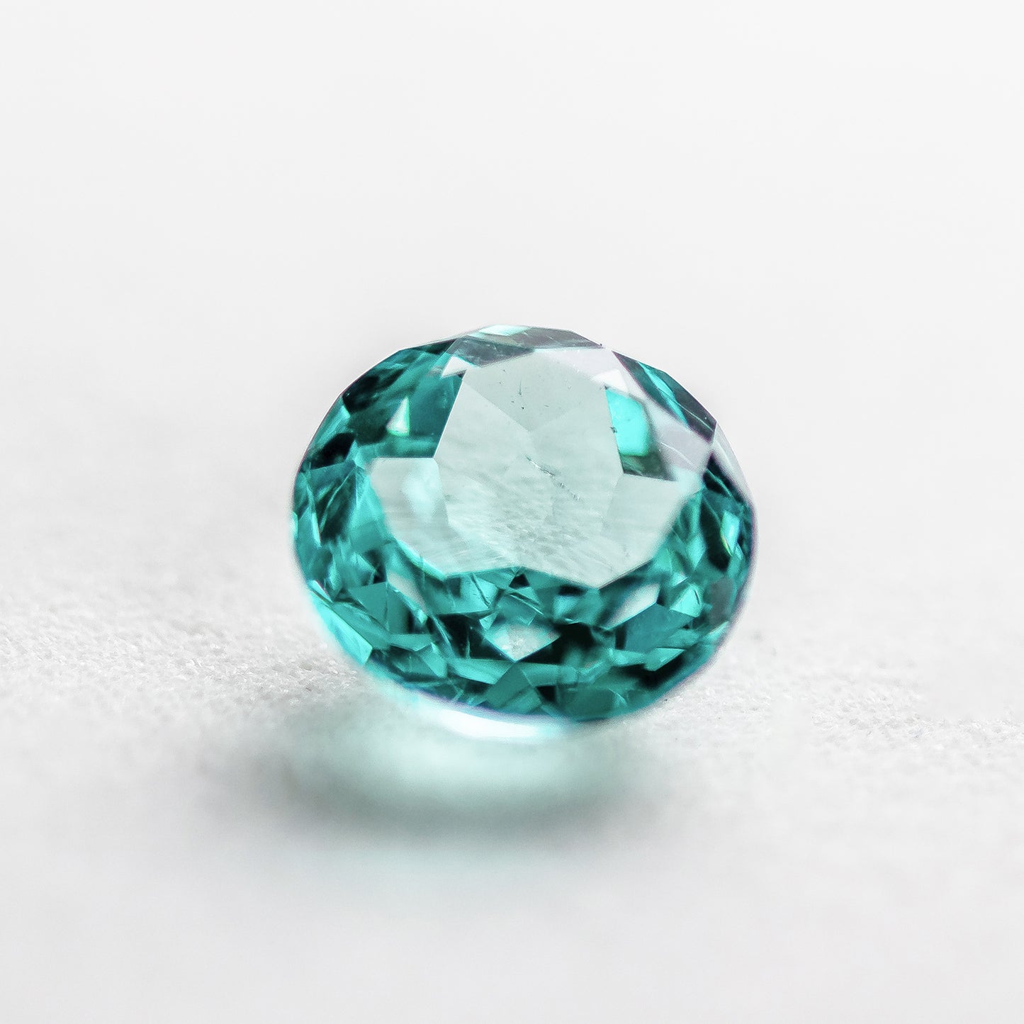 Nanosital #Z-108/B Paraiba with inclusions Rd 8 mm
