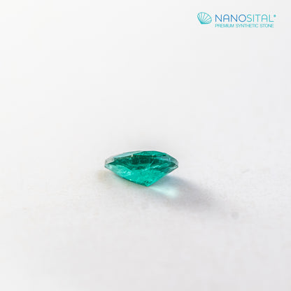 Nanosital #Z-22/B Emerald bluish with inclusions Pear 10*7 mm