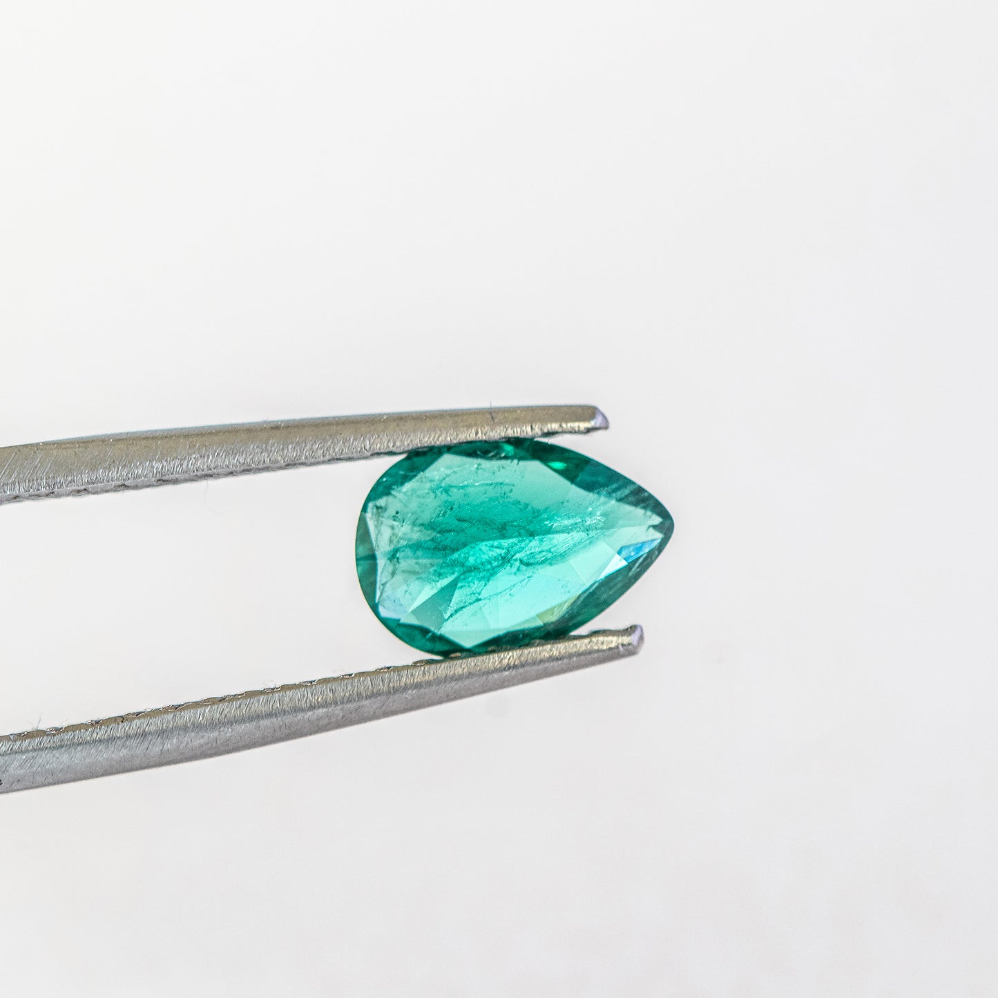 Nanosital #Z-22/B Emerald bluish with inclusions Pear 10*7 mm
