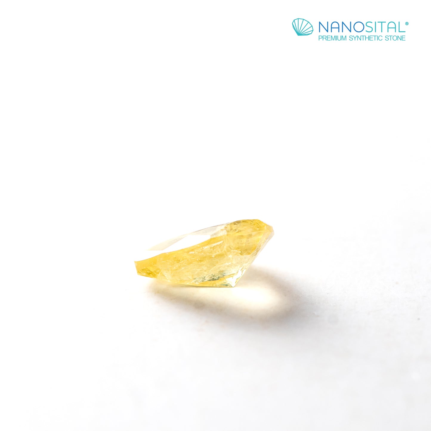 Nanosital #Z-7606 Yellow Sapphire with inclusions Pear 10*7 mm