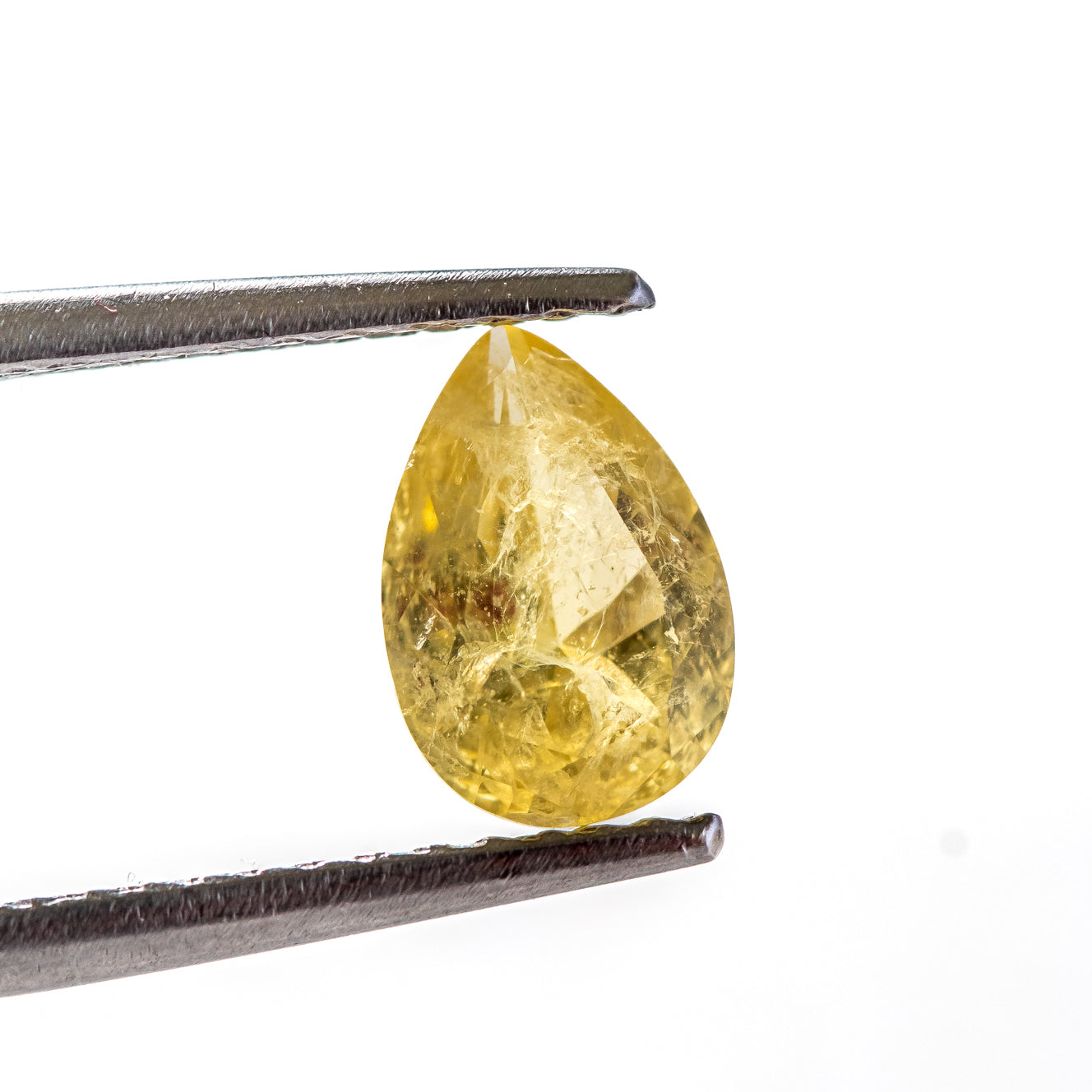 Nanosital #Z-7606 Yellow Sapphire with inclusions Pear 10*7 mm