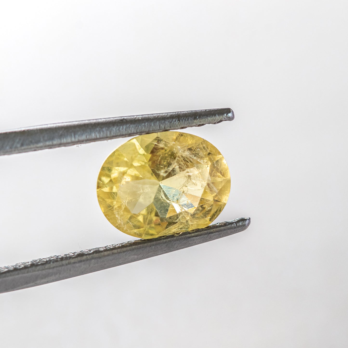 Nanosital #Z-7606 Yellow Sapphire with inclusions Oval 10*8 mm, 8*6 mm