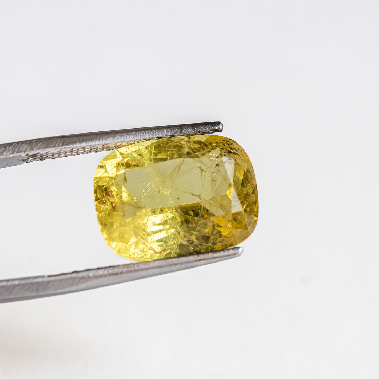 Nanosital #Z-7607 Yellow Sapphire with inclusions Cushion 16*12 mm