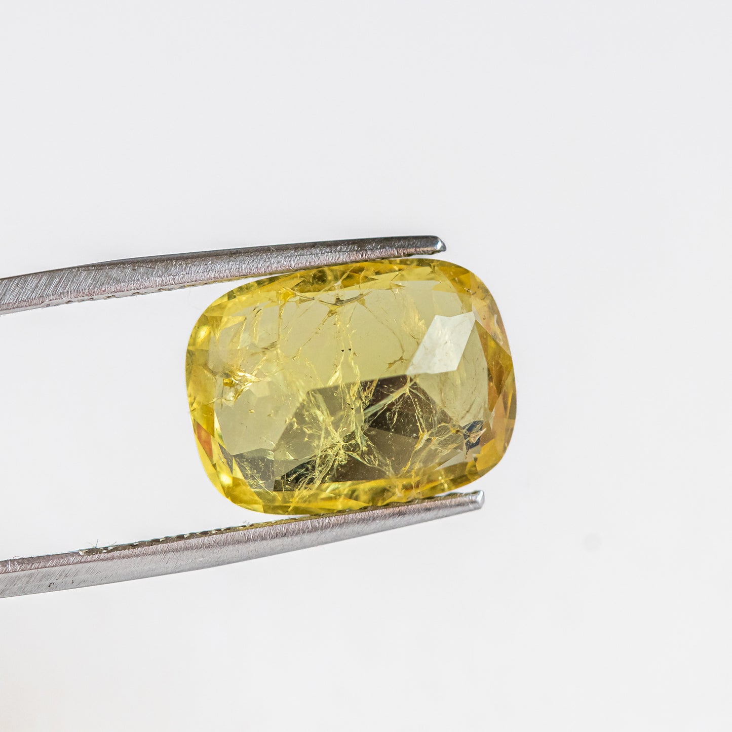 Nanosital #Z-7607 Yellow Sapphire with inclusions Cushion 16*12 mm