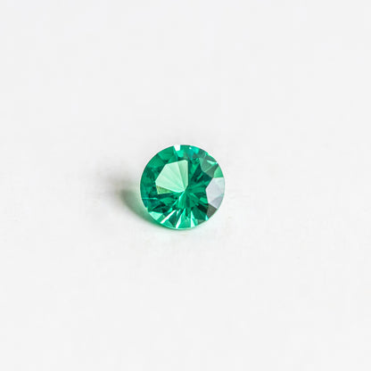 Nanosital #0/4  Emerald Light Round 8 mm