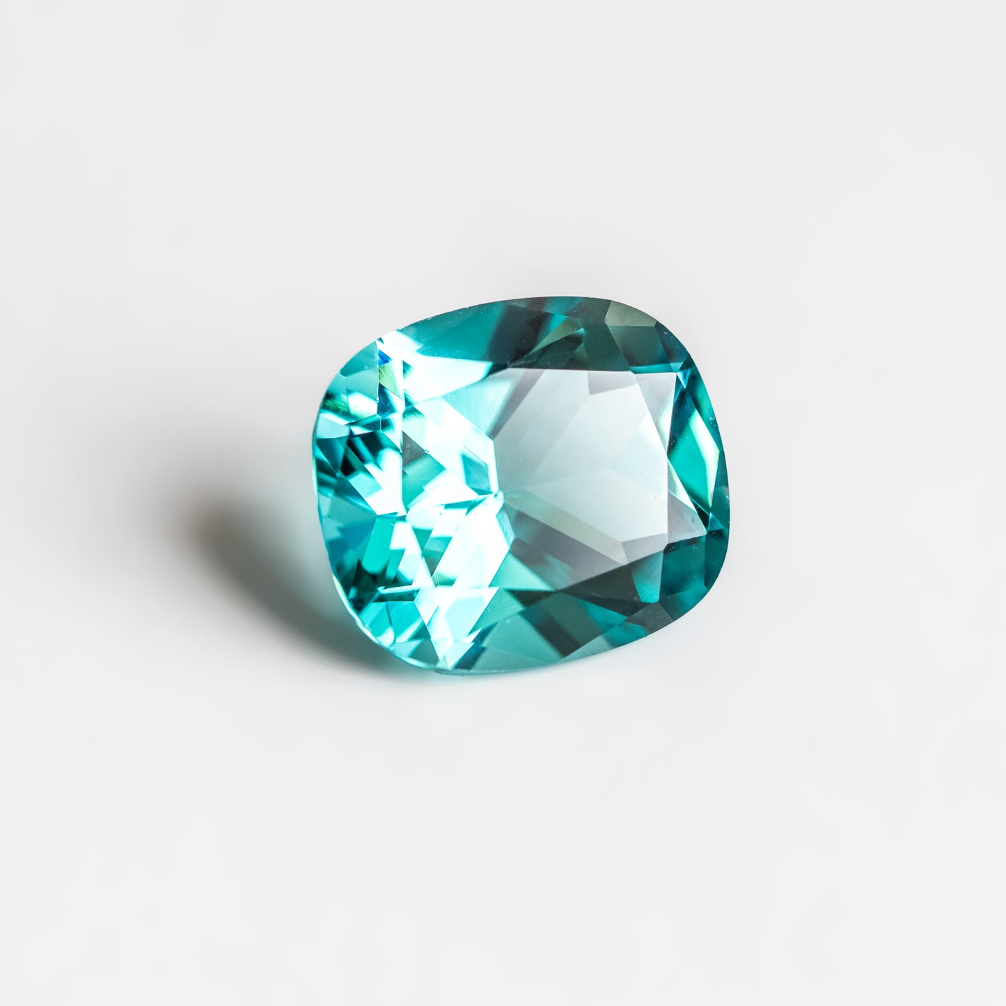 Nanosital #A-108/B Paraiba Cushion 16*14 mm