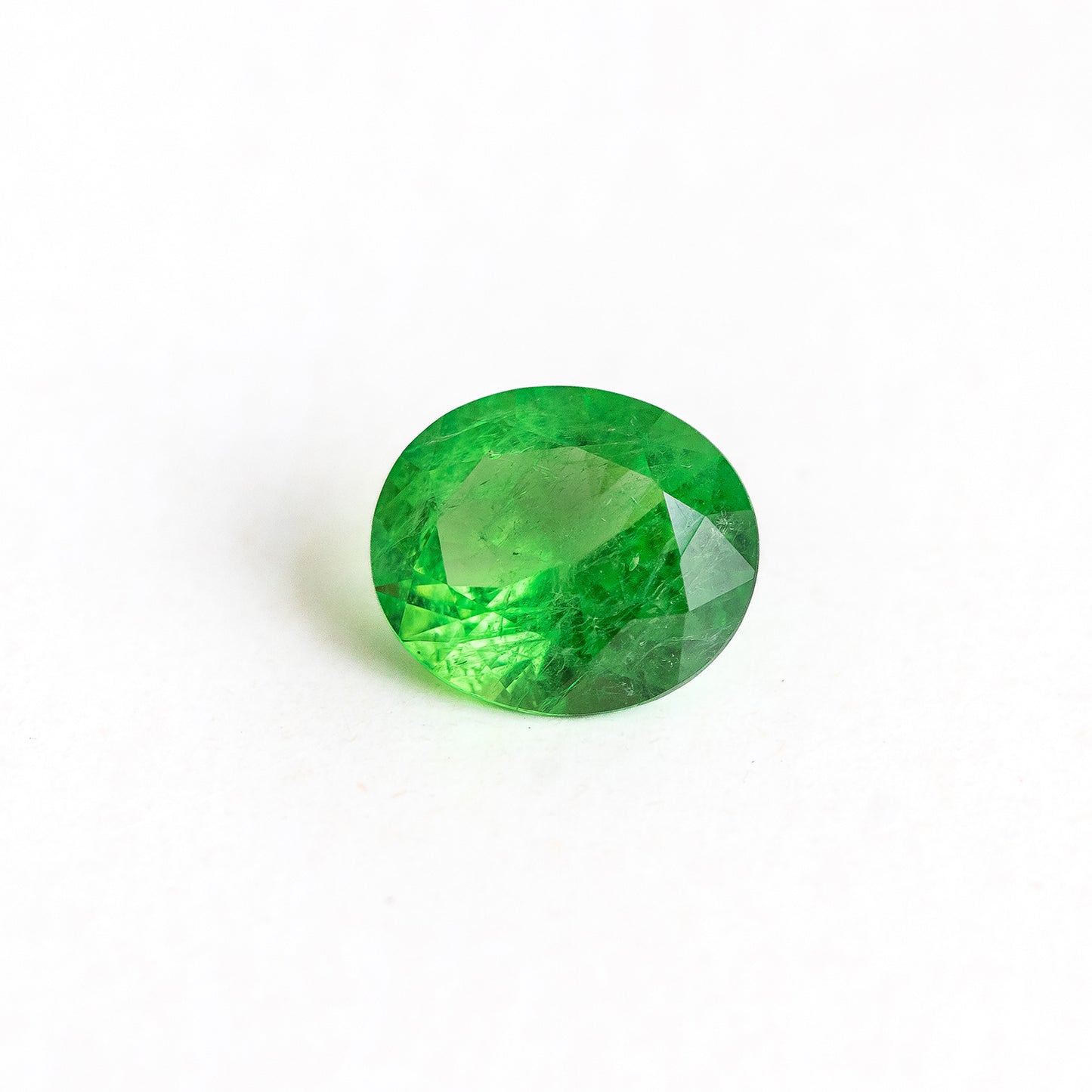 Nanosital #Z-3855 Light Tsavorite with inclusions Oval 14*12 mm