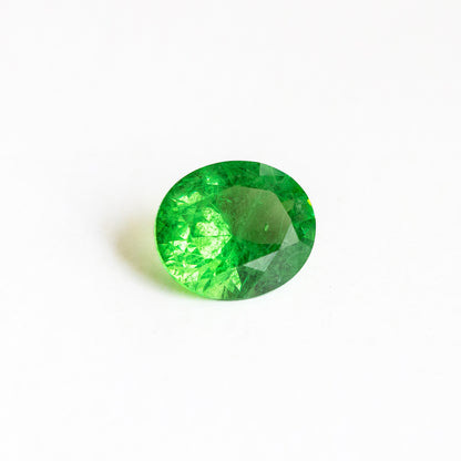 Nanosital #Z-3855 Light Tsavorite with inclusions Oval 14*12 mm