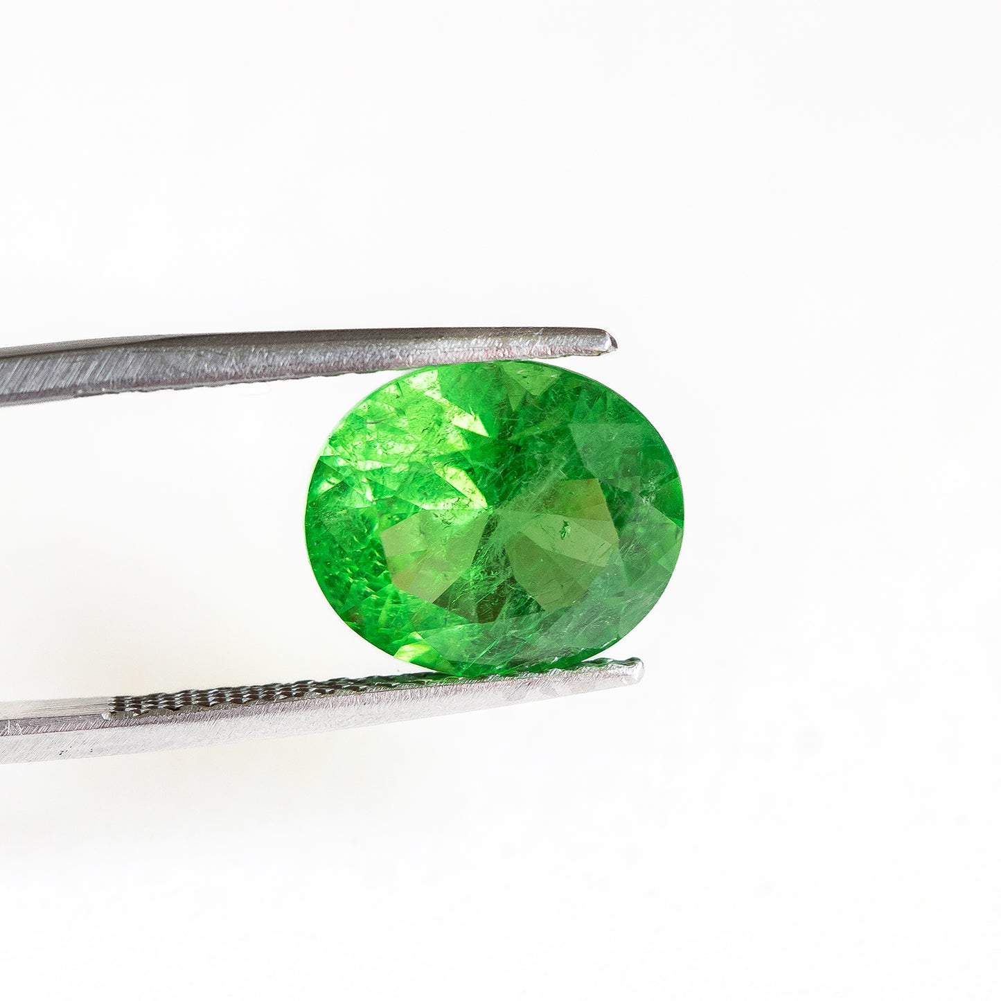 Nanosital #Z-3855 Light Tsavorite with inclusions Oval 14*12 mm