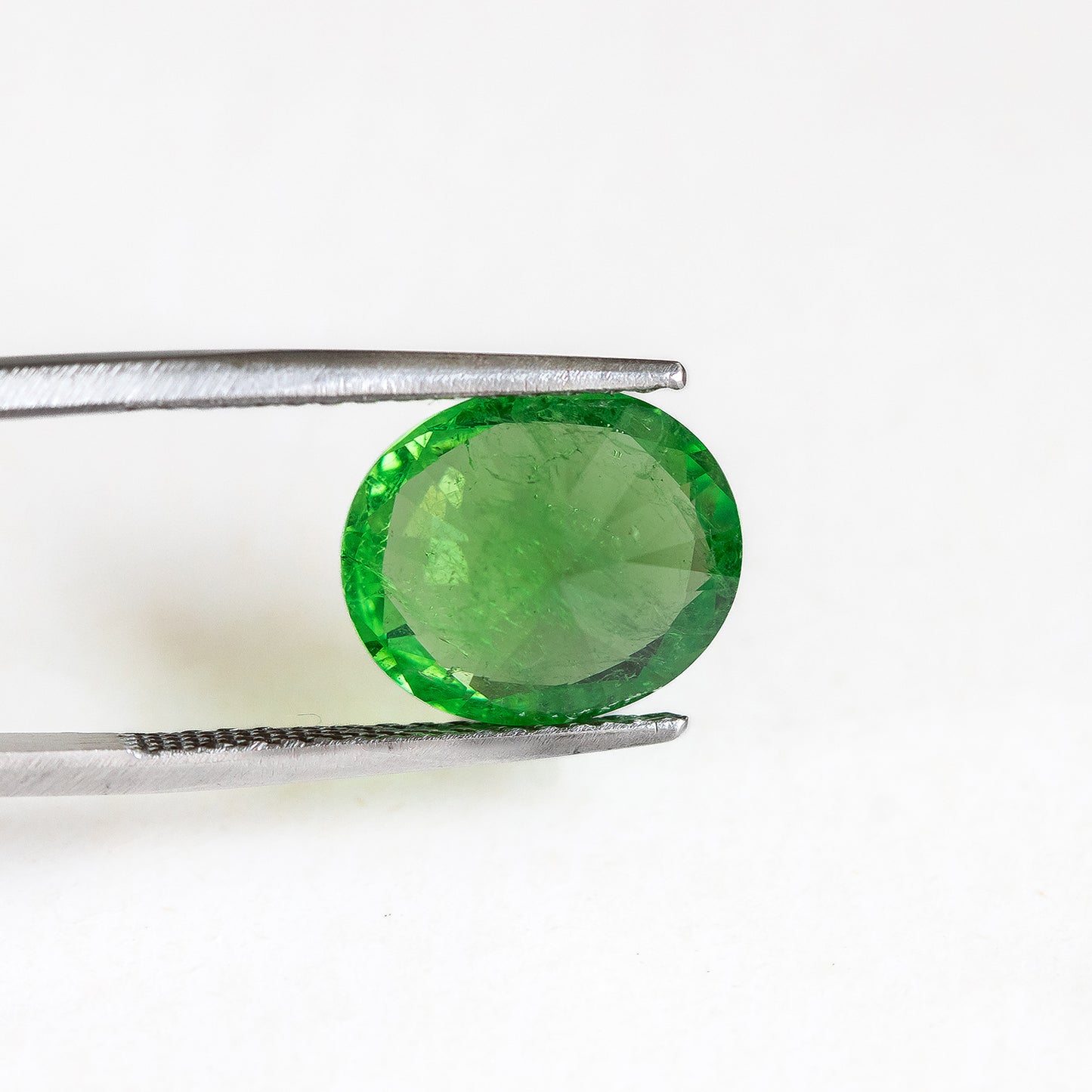 Nanosital #Z-3855 Light Tsavorite with inclusions Oval 14*12 mm