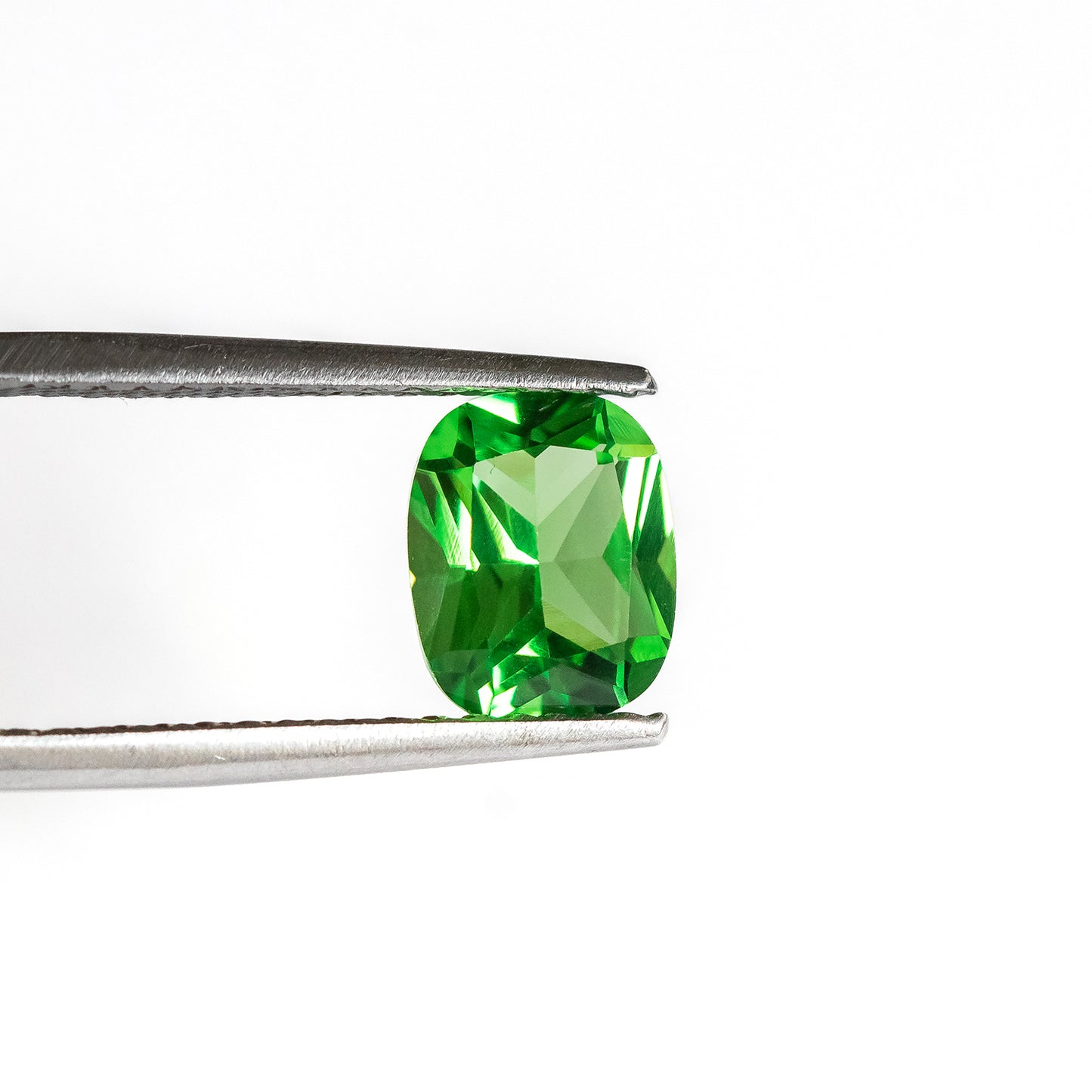 Nanosital #A-3855 Tsavorite Cushion 10*8 mm