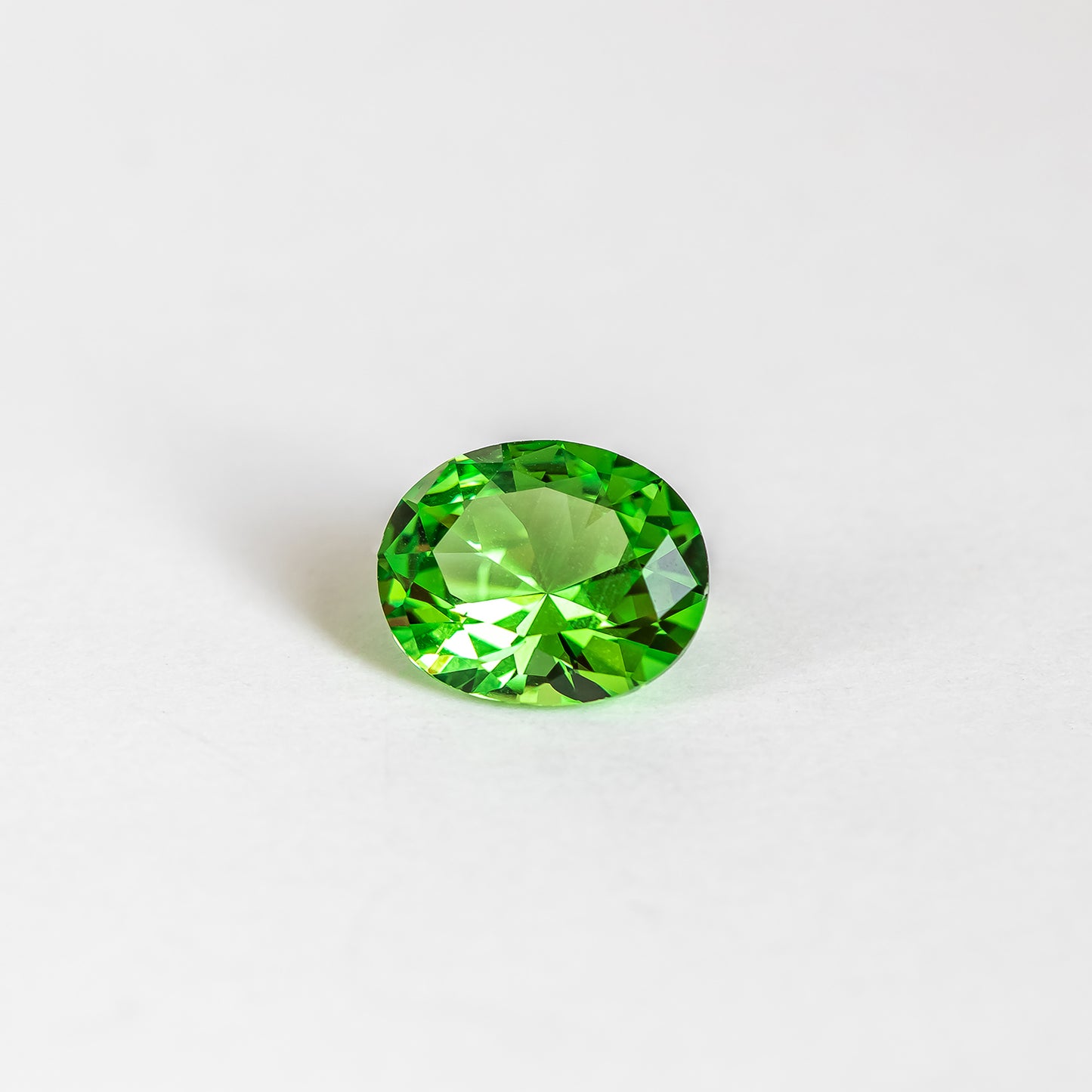 Nanosital #A-3855 Tsavorite Oval 14*12 mm, 12*10 mm