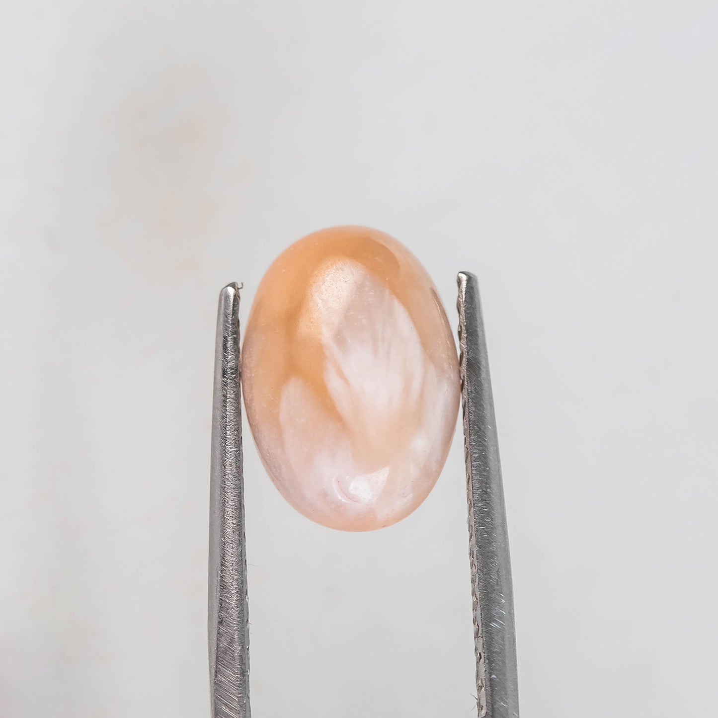 Nanosital #A-8544  Cat's eye Orange Oval Cab 14*10 mm
