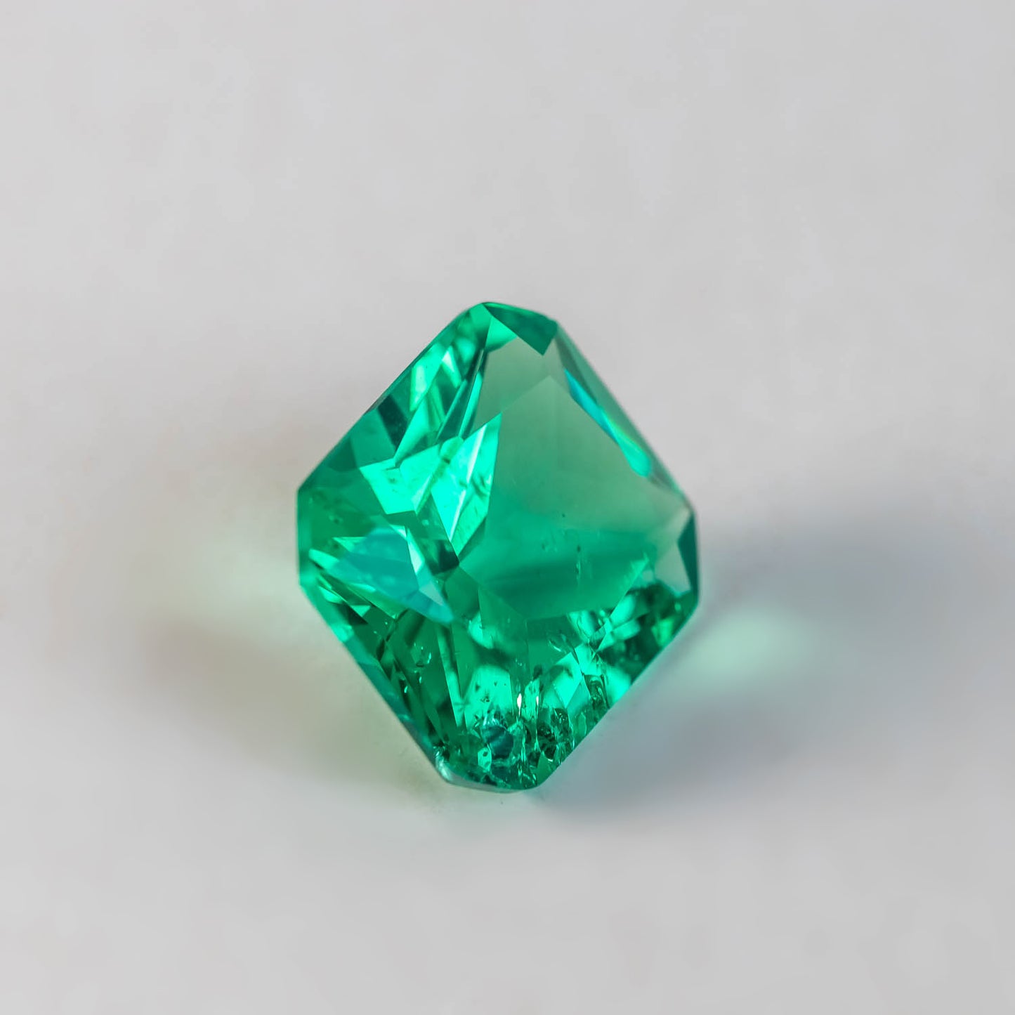 Nanosital #Z 0/4  Emerald with inclusions Octagon 14*12 mm Princess cut