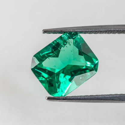 Nanosital #Z 0/4  Emerald with inclusions Octagon 14*12 mm Princess cut
