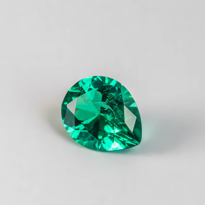 Nanosital #Z 0/4  Emerald with inclusions Pear 16*13 mm